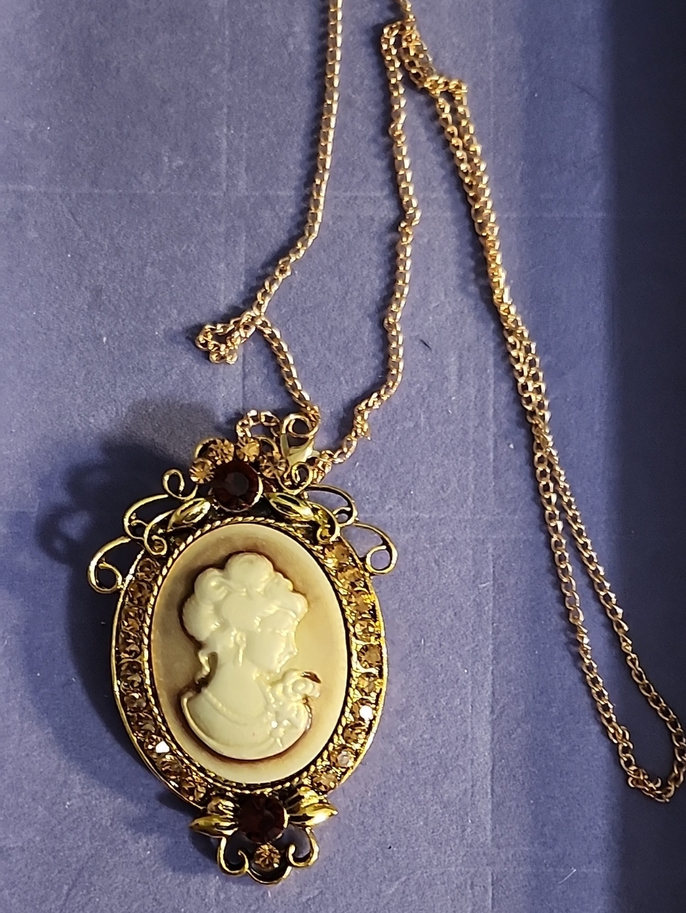 Gold Cameo Pendant Necklace with White Cameo Profile